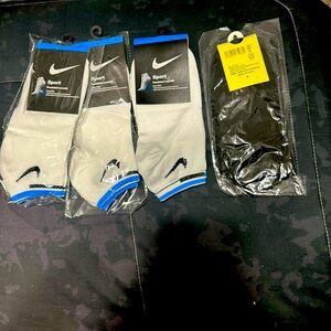 3 pair of low Nike socks white and blue 1 pair of low black socks